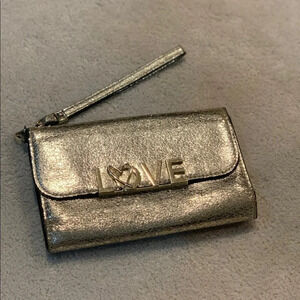 VICTORIA’S Secret shimmer phone wallet, golden